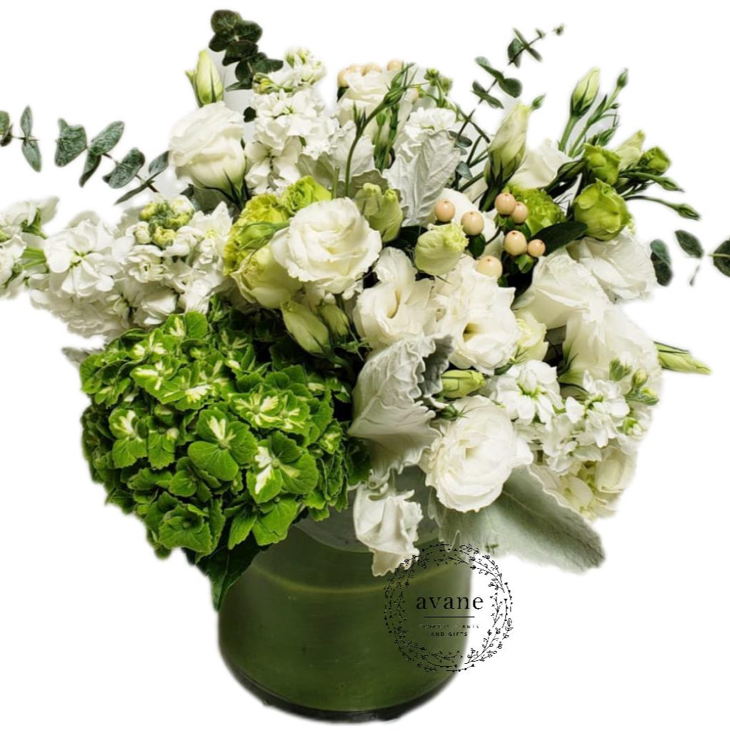 White & Green Blooms in Glass Vase
