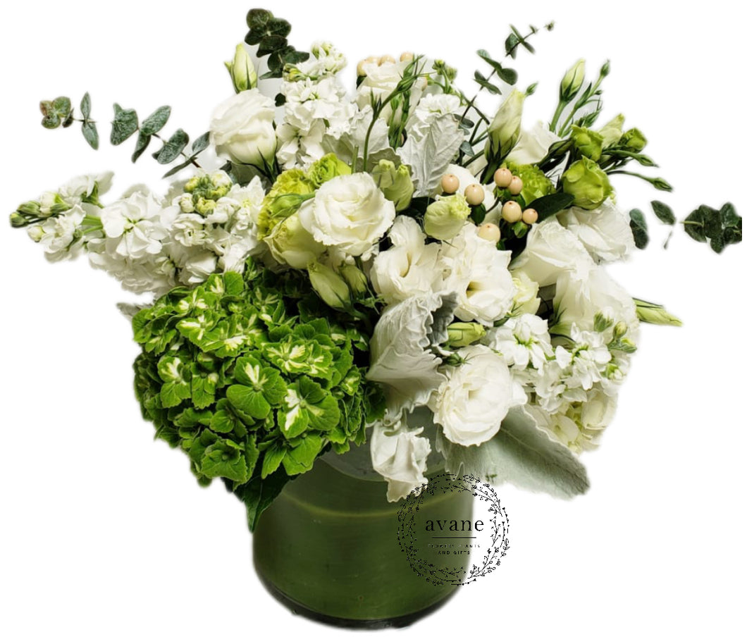 White & Green Blooms in Glass Vase